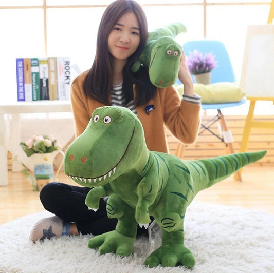 Adorable cartoon Tyrannosaurus dinosaur plush toy for kids, available in green, gray, and blue.