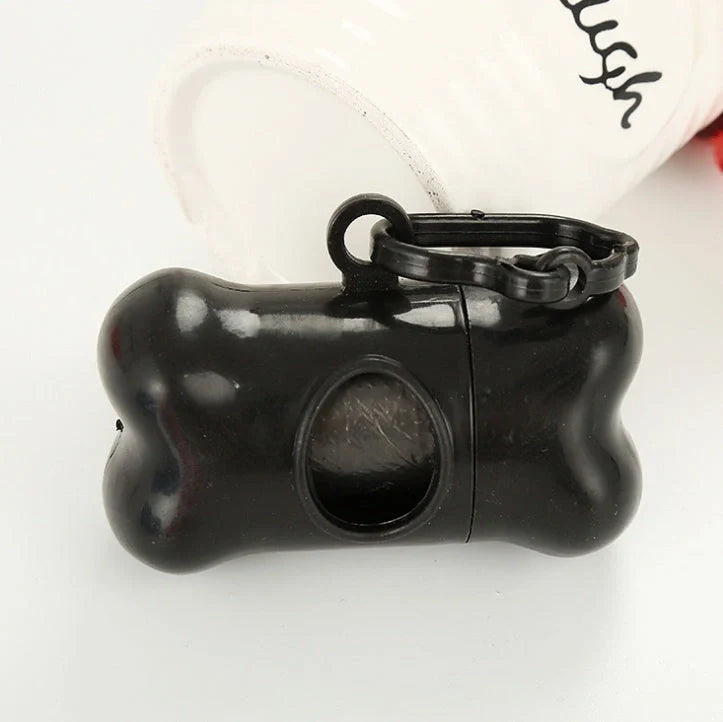 Compact black dog poop bag dispenser box with hook for easy transport