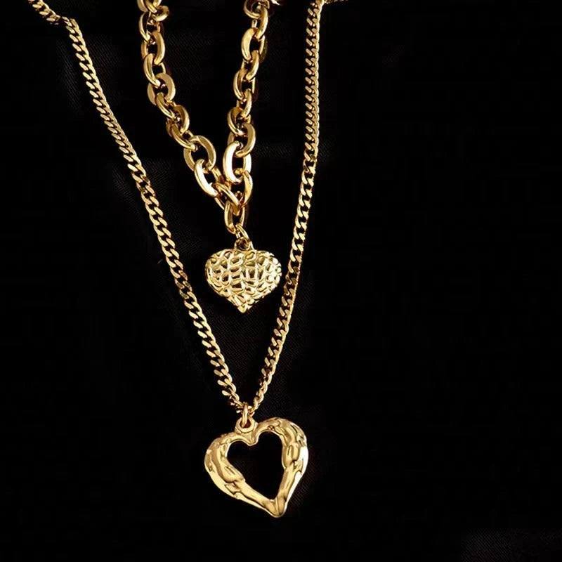 Titanium Steel Angel Wings Love Necklace with heart-shaped pendants and irregular folds design