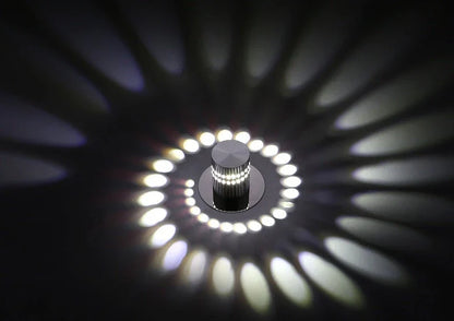 Colorful LED wall lights with a spiral design, featuring a wireless remote control for adjusting the vibrant color-changing display.