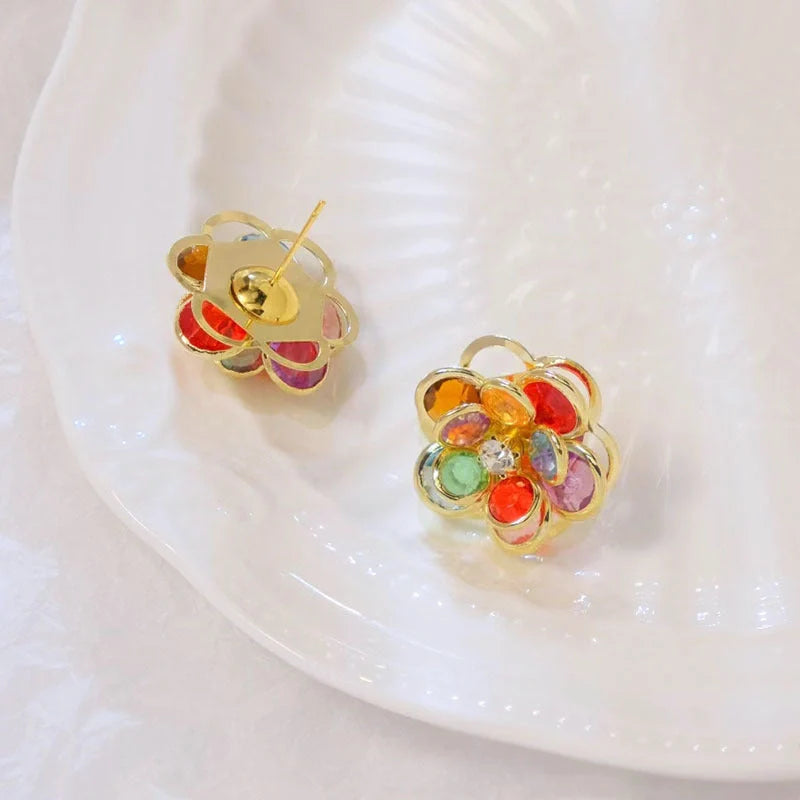 Small flower stud earrings for women in colour, black, and white options - sweet and trendy design