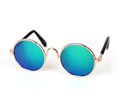Stylish pet sunglasses in various colors, including khaki, pink, green, and yellow