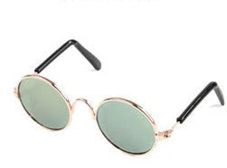 Stylish pet sunglasses in various colors, including khaki, pink, green, and yellow