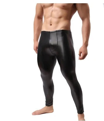 Sleek patent leather trousers with a slim, tailored silhouette and milk silk-like fabric for a luxurious, stage-ready look