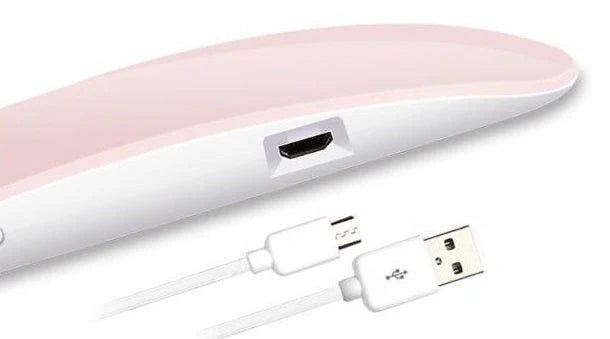 Compact and portable USB-powered nail light therapy machine with adjustable angle and LED light for at-home nail care
