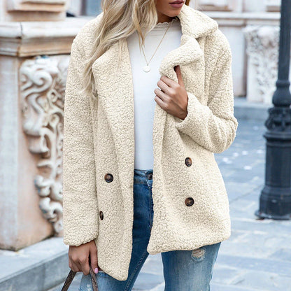 Cozy and stylish winter jacket for women, featuring a fluffy design, button closure, and a range of color options