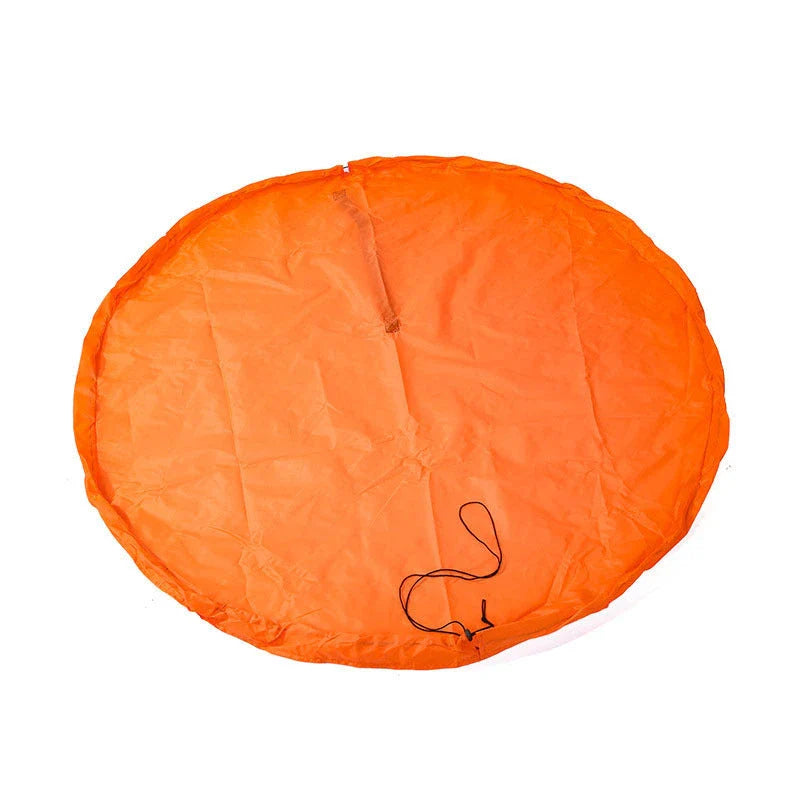Versatile Picnic Pad made of durable nylon, featuring waterproof surface and ample storage for baby toys and essentials.
