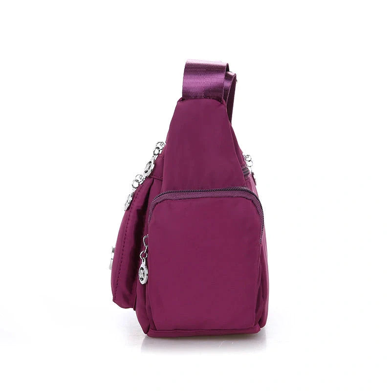 Ladies waterproof nylon oxford crossbody bag in various colors with multi-layer storage