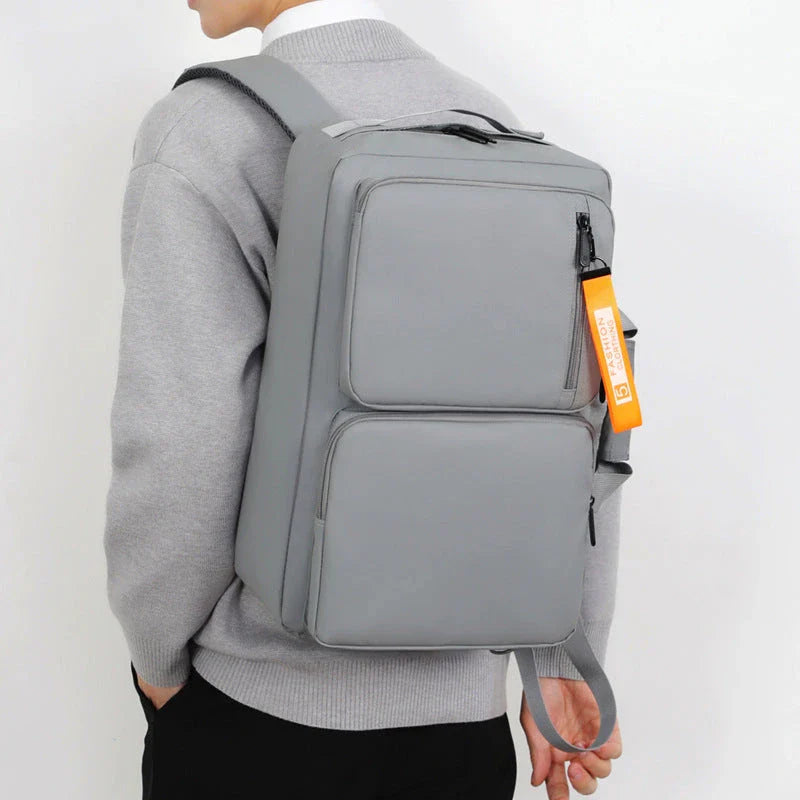 Versatile backpack with large capacity and laptop compartment, made of durable oxford cloth in grey and black colors