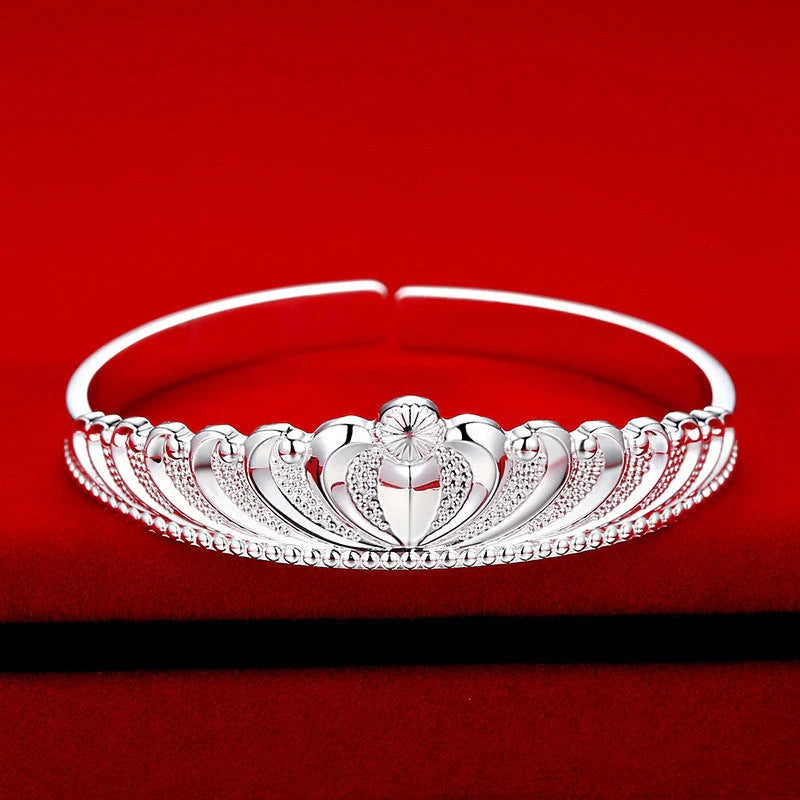 Women's silver electroplated crown bracelet with detailed design