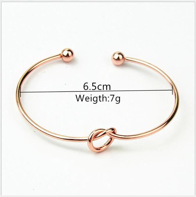 Elegant knotted O-type metal openwork bracelet in various colours