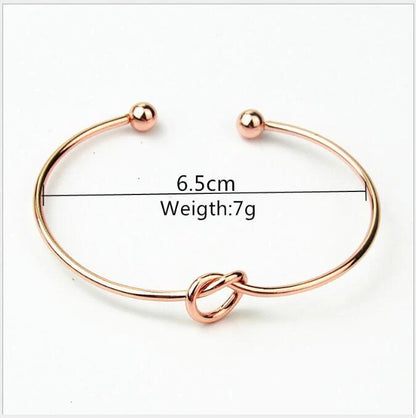 Elegant knotted O-type metal openwork bracelet in various colours