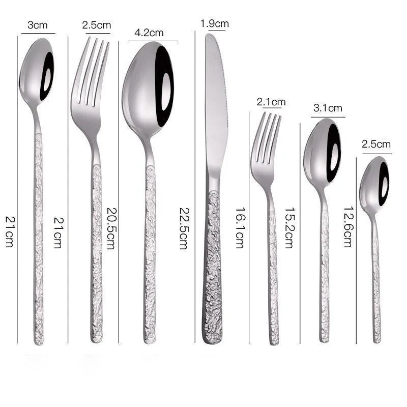 Premium steak cutlery set with embossed textured handles, made of durable stainless steel for a refined dining experience.