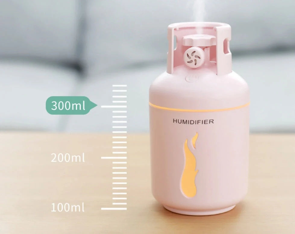 Multifunctional gas tank humidifier with USB connectivity in pink, blue, and white