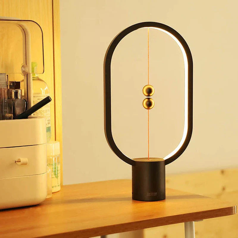 Premium magnetic bedside lamp with dual-colour LED lighting, touch-sensitive dimming controls, and sleek, compact design for bedroom