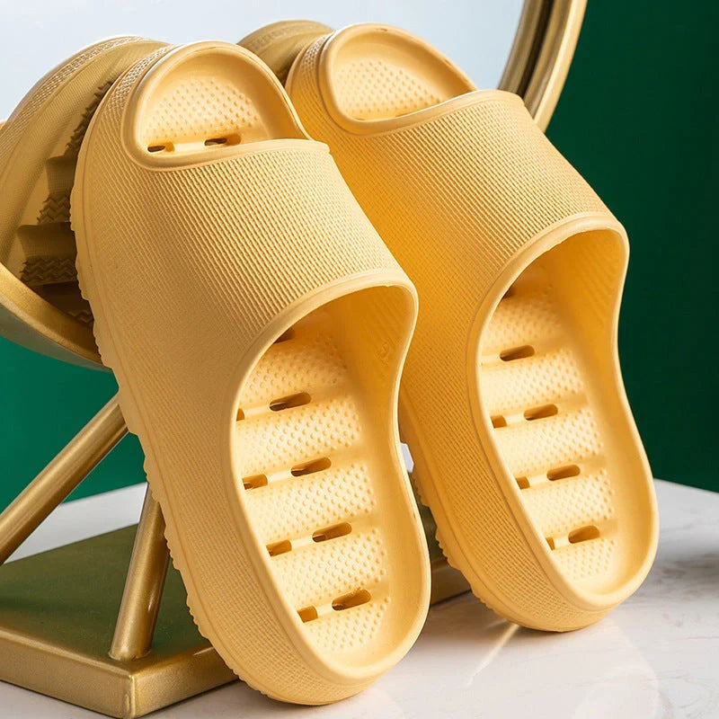 Thick-soled EVA slippers in various colours with non-slip sole and water leakage design
