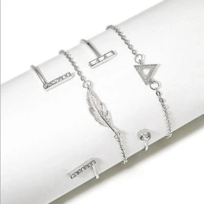 Adjustable geometric bracelet set with crystal and leaf motifs