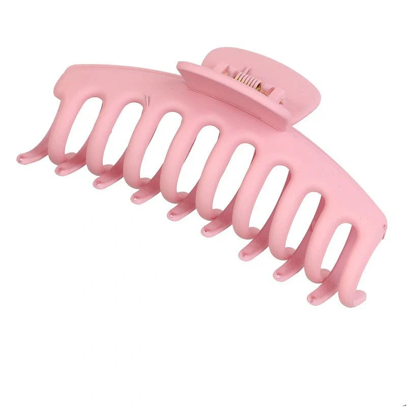 Candy-coloured plastic ponytail clip for showers and daily hair styling