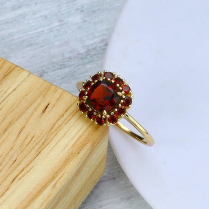 Elegant vintage-style cocktail ring featuring a pomegranate-inspired design with intricate micro-mosaic details and a mesmerising diamond surface.
