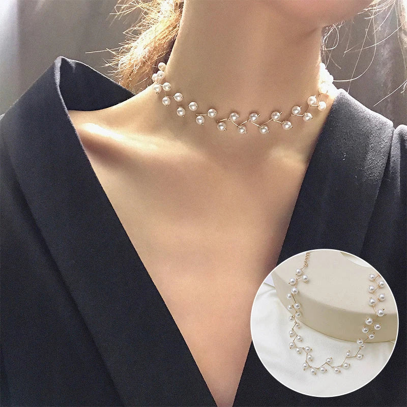Elegant collection of pearl and crystal necklaces in various styles, including gold, silver, and two-piece sets