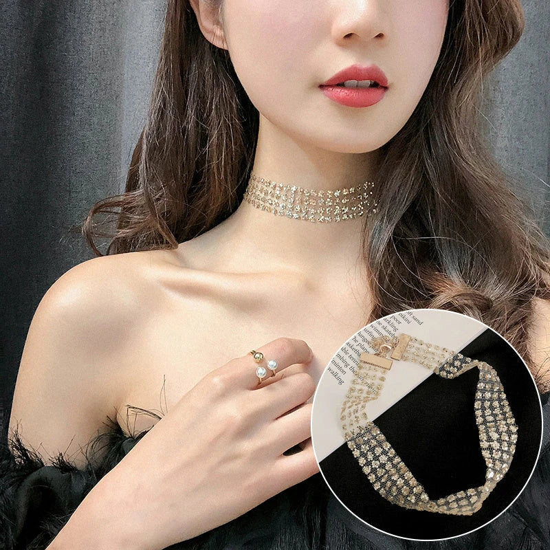 Elegant collection of pearl and crystal necklaces in various styles, including gold, silver, and two-piece sets