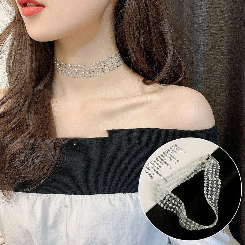 Elegant collection of pearl and crystal necklaces in various styles, including gold, silver, and two-piece sets