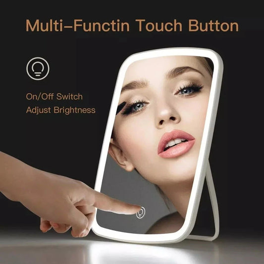 Adjustable LED makeup mirror with three-colour lighting, high-definition glass, and foldable design for versatile grooming on the go
