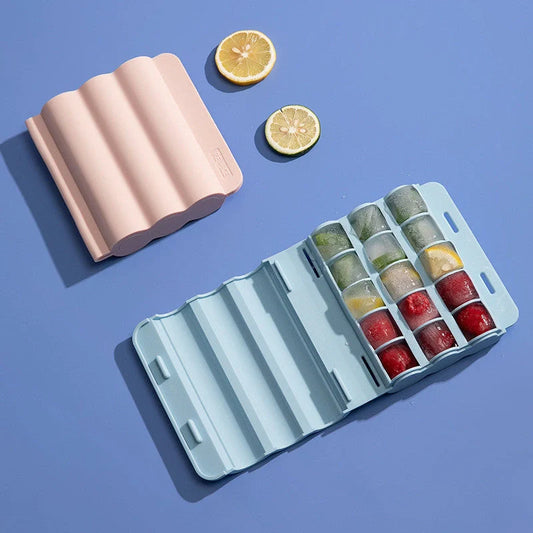 Silicone ice tray for making homemade ice hockey pucks in light blue, pink, and dark blue