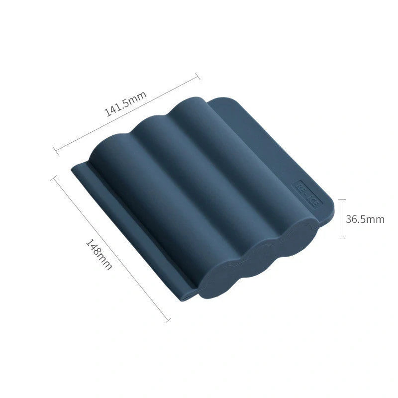 Silicone ice tray for making homemade ice hockey pucks in light blue, pink, and dark blue
