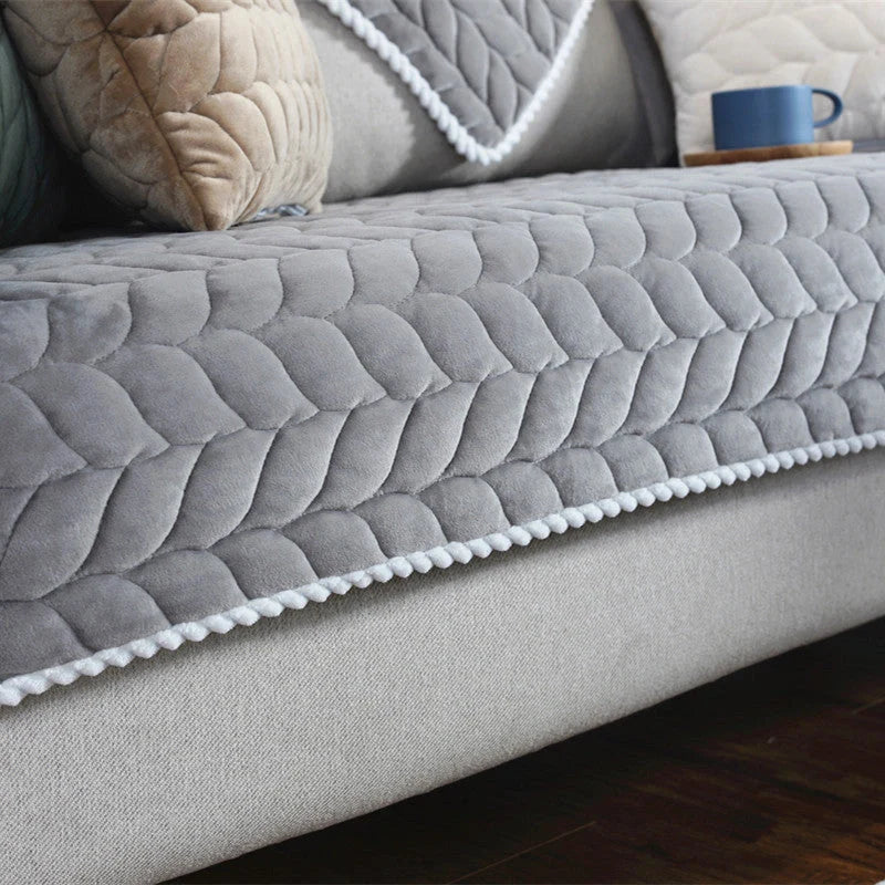 Thick plush quilted sofa cover in various colours on a modular sofa