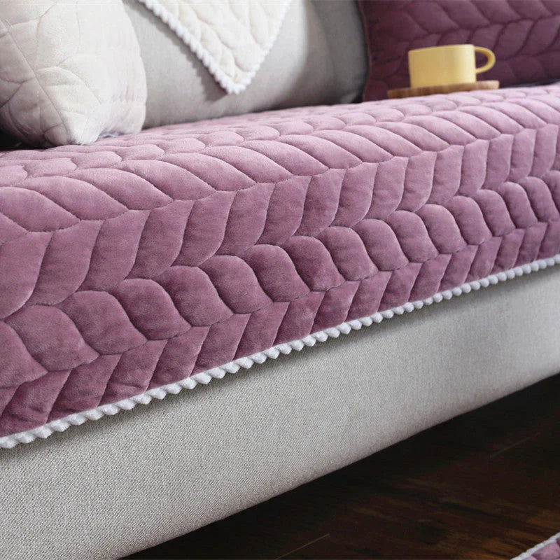 Thick plush quilted sofa cover in various colours on a modular sofa
