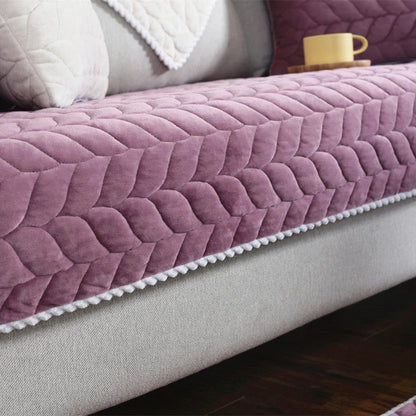 Thick plush quilted sofa cover in various colours on a modular sofa