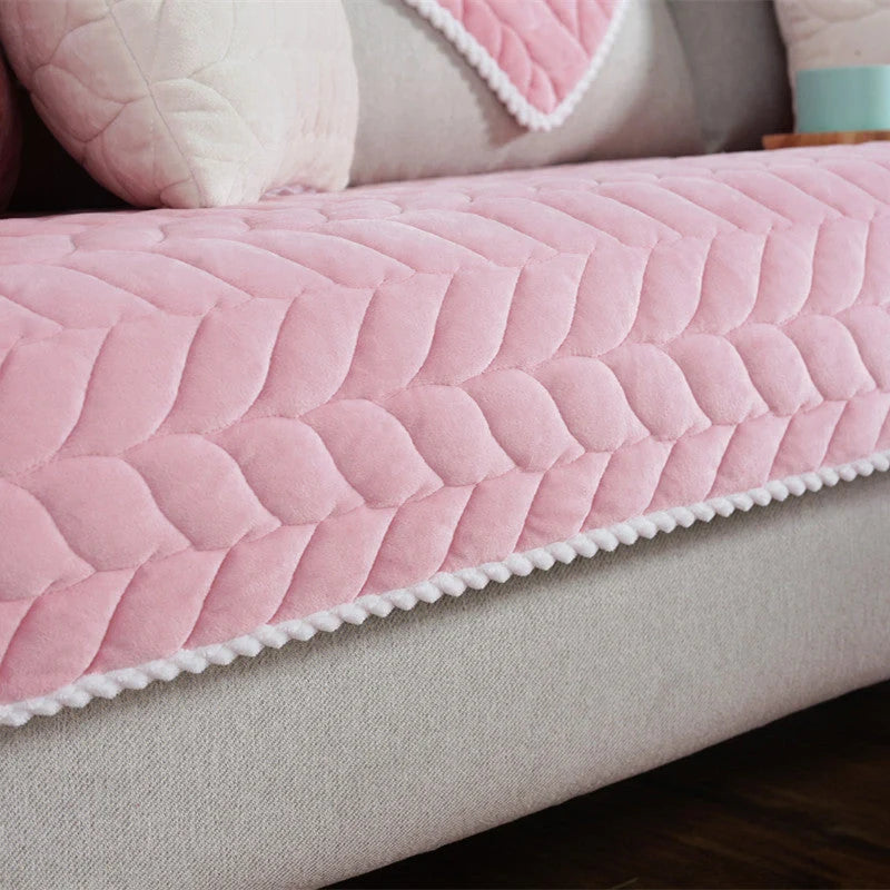 Thick plush quilted sofa cover in various colours on a modular sofa