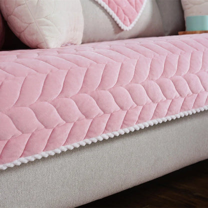 Thick plush quilted sofa cover in various colours on a modular sofa