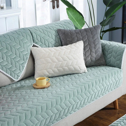 Thick plush quilted sofa cover in various colours on a modular sofa