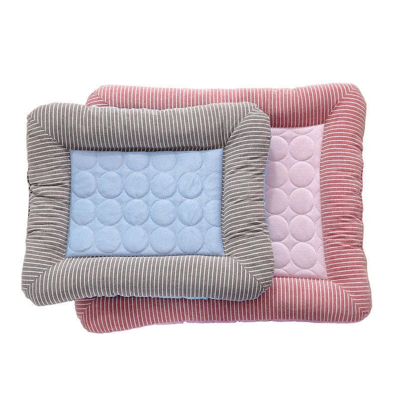 A cooling pet bed made of breathable fabric that provides a refreshing chill for dogs and cats to stay comfortable during hot weather.
