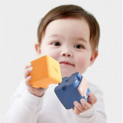 Soft plastic building blocks with animal relief designs for infants and toddlers