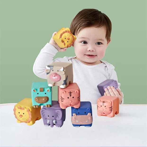 Soft plastic building blocks with animal relief designs for infants and toddlers