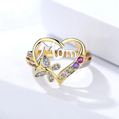 Elegant rhinestone heart-shaped ring in gold color with a dazzling array of multicolored rhinestones