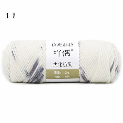 Luxurious gradient milk cotton yarn balls in a variety of vibrant colours, perfect for knitting, weaving, and other textile crafts.