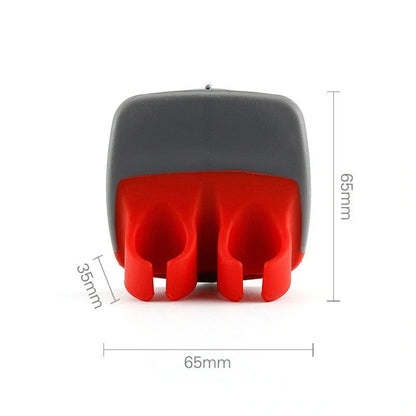 Two-finger peeler with ergonomic grip and stainless steel blade