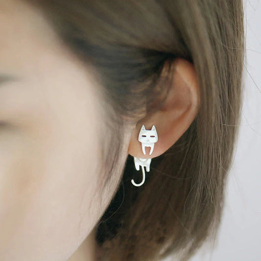 Elegant asymmetric 925 sterling silver stud earrings with cat and fish motifs, a modern and sophisticated accessory