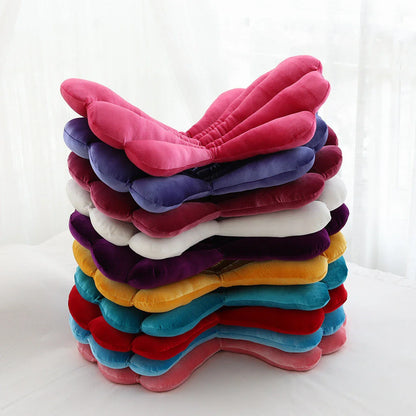 Luxurious velvet armchair cushion with unique rose seat design, available in various colours for comfortable relaxation in your living space.