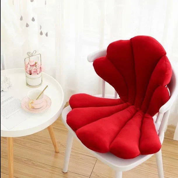 Luxurious velvet armchair cushion with unique rose seat design, available in various colours for comfortable relaxation in your living space.