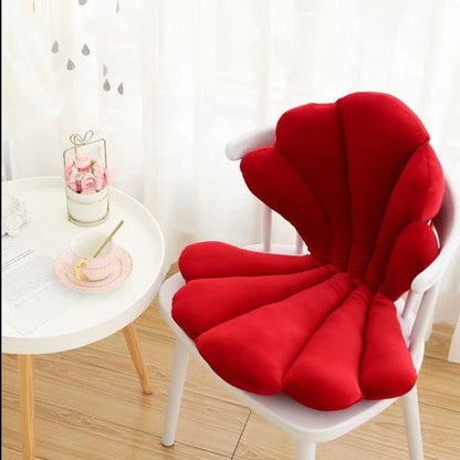Luxurious velvet armchair cushion with unique rose seat design, available in various colours for comfortable relaxation in your living space.