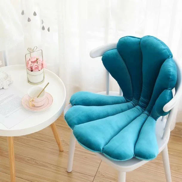 Luxurious velvet armchair cushion with unique rose seat design, available in various colours for comfortable relaxation in your living space.
