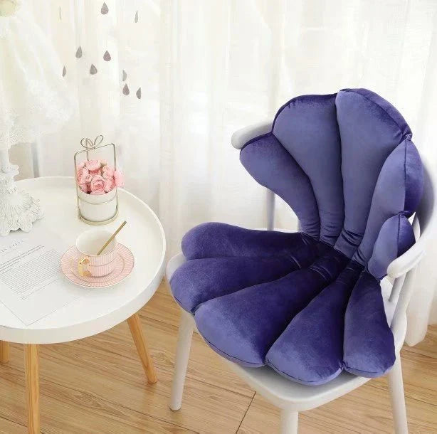 Luxurious velvet armchair cushion with unique rose seat design, available in various colours for comfortable relaxation in your living space.