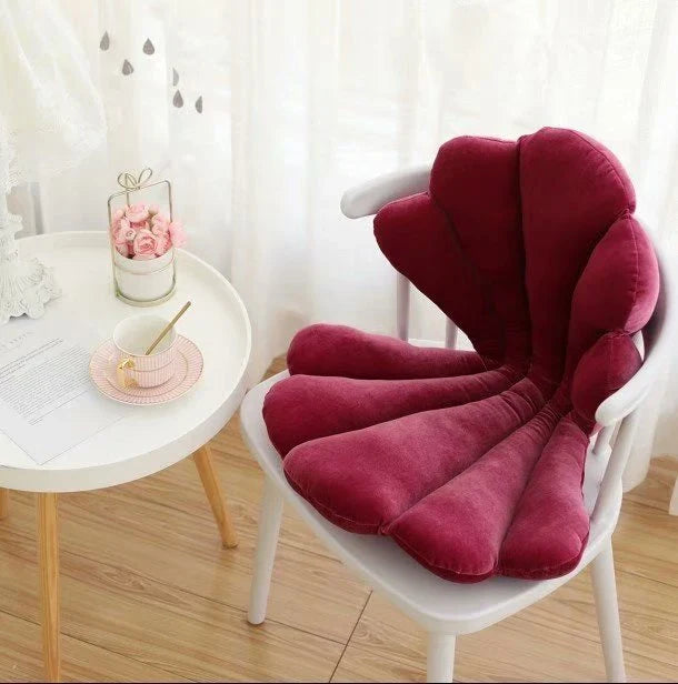 Luxurious velvet armchair cushion with unique rose seat design, available in various colours for comfortable relaxation in your living space.
