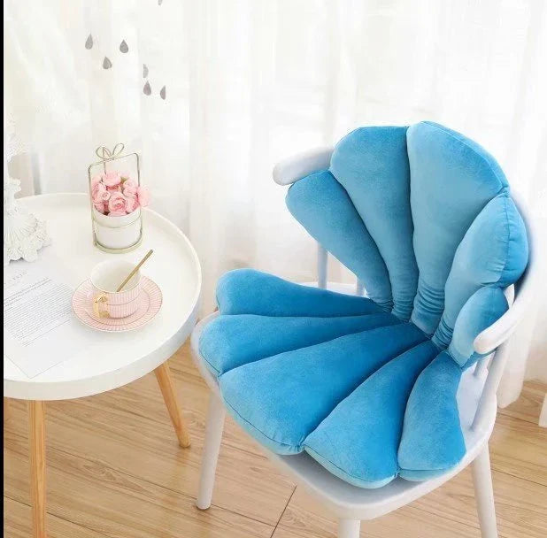 Luxurious velvet armchair cushion with unique rose seat design, available in various colours for comfortable relaxation in your living space.
