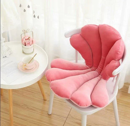 Luxurious velvet armchair cushion with unique rose seat design, available in various colours for comfortable relaxation in your living space.